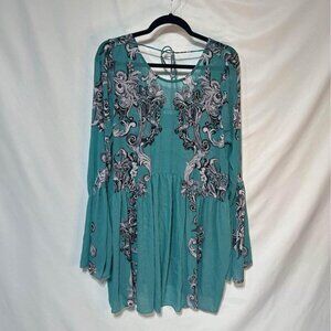 FREE People woman’s swing dress. Flare sleeves. Slightly sheer. Large. Great